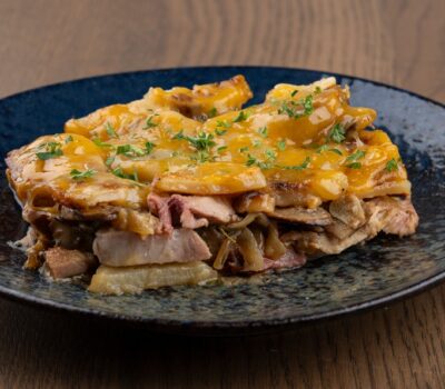 A rich, cozy way to give new life to your leftover Perry’s Pork Chop —layered with potatoes, mushrooms, and a savory cream sauce.