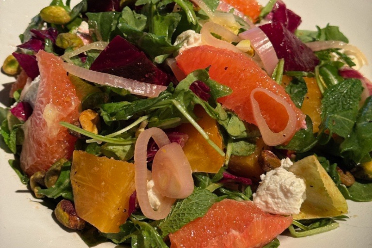 Mixed greens with goat cheese, oranges, beets, and citrus honey vinaigrette