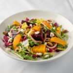 Mixed greens with goat cheese, oranges, beets, and citrus honey vinaigrette
