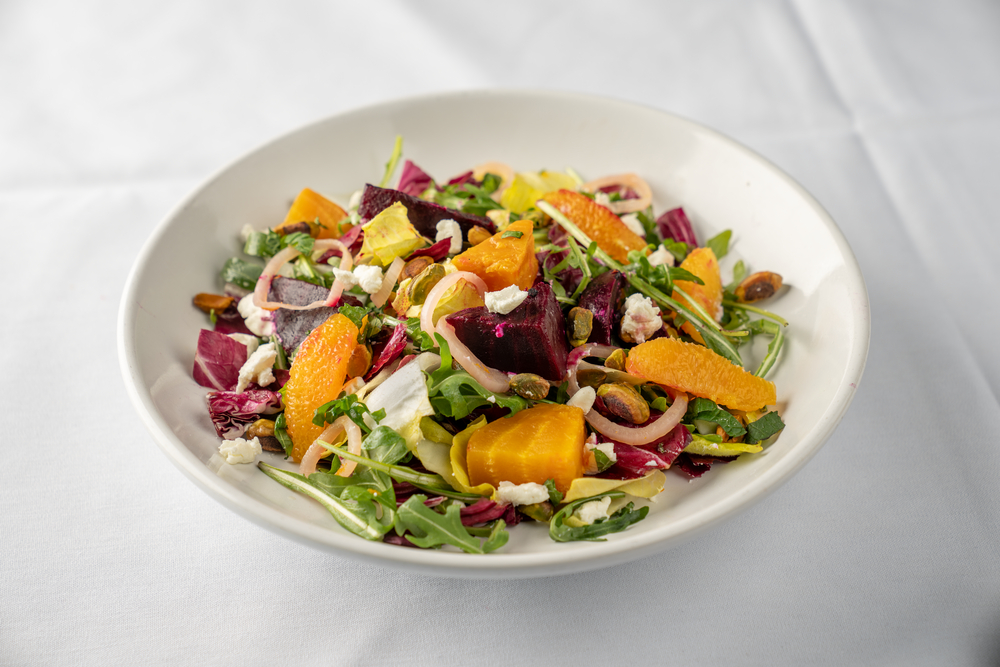 Mixed greens with goat cheese, oranges, beets, and citrus honey vinaigrette